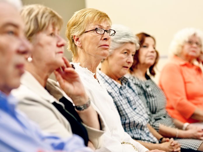 A group of people sitting