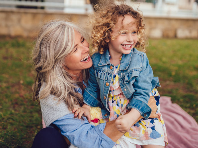 A women holding a girl