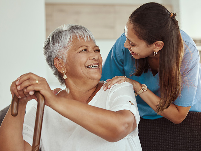 A Medicare eligible person playing the guitar