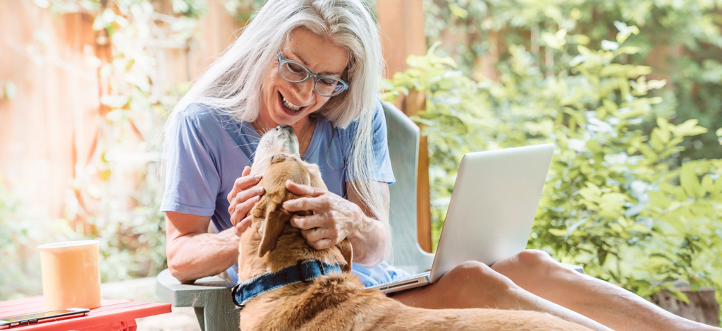 woman petting dog