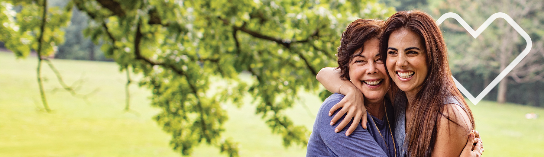 Hispanic mother and daughter hugging